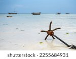 A Boat Anchor On The Beach In...