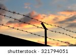 Barbed Wire Fence With Twilight ...