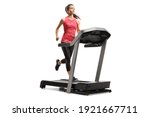 Young female athlete running on a treadmill isolated on white background