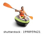 Smiling young man in a canoe with a life vest and a paddle isolated on white background