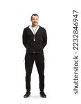 Small photo of Full length portrait of a sports trainer with a whistle isolated on white background