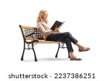 Mature woman sitting on a bench ...