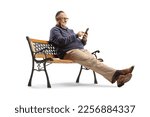 Mature man sitting on a bench and using a smartphone isolated on white background