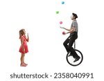 Small photo of Full length profile shot of a girl looking at a mime juggling and riding a unicycle isolated on white background