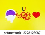 Small photo of Human brain, magnet, heart metaphor symbolise as subconscious mind send energy law of attraction, like attract like. Subconscious mind send the vibration. Attract romance, love, relationship.