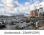 Small photo of Causeway Bay, Hong Kong - August 7, 2022: Afternoon view of Causeway Bay Typhoon Shelter in Summer.