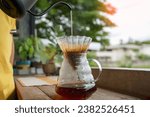 Small photo of Drip coffee is a method of brewing pour-over or filter brewers in which the method of brewing coffee without a brewer is simply using water through coffee grounds and a filter (paper filter)