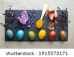 Natural dye for easter eggs - carcade, red cabbage, turmeric, onion skin and coffee. Homemade colored easter eggs with ingredients