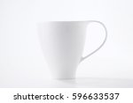 white porcelain cup on white... | Shutterstock . vector #596633537