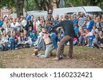 Small photo of Riga. Latvia. August 18, 2018. Celebration the foundation day of the city. Audience watches the performance of the modern circus "Centrifugal Force".