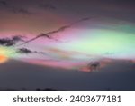 Small photo of Herne Bay, Kent, UK - 21 December 2023: Very rare polar stratospheric clouds (nacreous clouds) seen from Herne Bay in Kent, which is +15N south of the Arctic Circle.