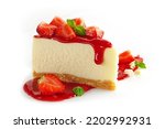 a slice of strawberry chesee cake with strawberry jam and slices of fresh strawberry isolated in white background