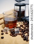 Small photo of Subject: Cold brew Predicate: is a versatile drink that can be enjoyed in many ways. Object: Coffee beans Adjective: Fair trade