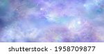 Small photo of Beautiful heavens above celestial concept background banner - beautiful blue pink purple green lilac light filled heavenly ethereal cloud scape depicting the heavens above
