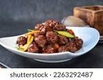 Small photo of Sauteed Fried Meat Balls with Brown Sauce，sweet and sour pork Meat Balls