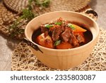 Small photo of Chinese food, delicious food, Stew radish and beef brisket,Beef Offal,Beef Entrails in claypot