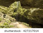 Wet Cave Entrance / A cave entrance with a small waterfall that formed during a rain storm.
