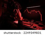 Stress Business man look at the Computer Screen, The red crashing market volatility of crypto trading with technical graph and indicator, red candlesticks going down without resistance,
market crash, 