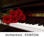 Red Rose Bouquet On The Piano...