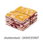 Small photo of two slices of multilayer cocoa sponge cake with almonds