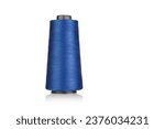 Small photo of spool of industrial threads blue colors, texture of threads on a white background close-up