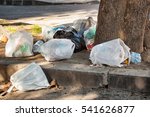 Small photo of Garbage bag on the street abandoned by uncivilized people.