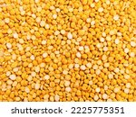 Small photo of Split chickpeas legume dal chana Bengal gram lentils pulse yellow organic food full with protein harbara channa daal uncooked splitchickpea closeup view image picture stock photo.