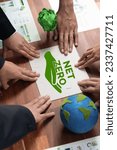 Small photo of Cohesive group of business people forming jigsaw puzzle pieces in net zero icon symbol as eco corporate responsibility to reduce CO2 emission as sustainable solution for greener Earth. Quaint