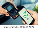 Small photo of Hand holding smartphone with NFC QR code device, scanning contactless payment code for fast digital transaction. Online banking app on mobile phone for modern lifestyle payment technology. fervent