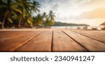 Small photo of The empty wooden table top with blur background of Thailand beach. Exuberant image.