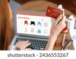 Small photo of Woman shopping online on internet marketplace browsing for sale items for modern lifestyle and use credit card for online payment from wallet protected by utmost cyber security software