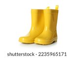 Yellow rubber boots isolated on white background
