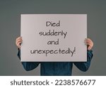 Small photo of Died suddenly and unexpectedly, young man holds sign, clarification of the increase of mortality, death rate covid-19 jab