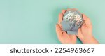 Small photo of Hands holding paper head, human brain with flowers, self care and mental health concept, positive thinking, creative mind, generative AI used for brain
