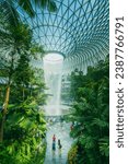 Small photo of 2 November 2023 : Tourist attraction Waterfall HSBC Rain Vortex in Jewel Changi Terminal 2 airport at Singapore