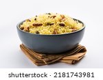 Small photo of Kashmiri sweet modur pulao made of rice cooked with sugar, water flavored with Saffron and dry fruits