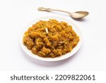 Small photo of Besan Halwa, shira, sheera is a rich dessert made with gram flour, ghee and sugar