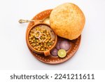 Small photo of Chole bhature is a North Indian food dish. A combination of chana masala and bhatura or puri