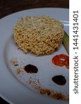 Small photo of instant noodles with real ingredients. Instant noodles are in a precooked and dried noodle in bag or cup. The main ingredients are flour, starch, salt, sodium carbonate and potassium carbonate.