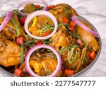 Small photo of Nkwobi (Cow Foot Special) is served in popular restaurants and is considered a delicacy in eastern Nigeria