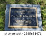 Small photo of Atlanta GA USA: March 30, 2023 – Granite plaque embedded in grounds of Carter Presidential Center reads The Faith Myabi Wilson Lake, 2004, gift from her parents on occasion of her birth. 39th Pres.