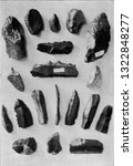 Small photo of Flint instruments from the layers of the posterior diluvium of the valley of the Vezere, vintage photo. From the Universe and Humanity, 1910.