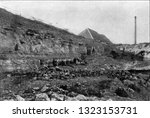 Small photo of Excavations in the limestone tuff of Eringsdorf near Weimar, whose deepest layers contain remnants of Diluvium mammals, vintage photo. From the Universe and Humanity, 1910.