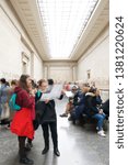 Small photo of London, UK - March 4, 2019: tourists visiting Ancient Greek collection of Phaeton in British Museum.