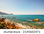 Beautiful landscape with a rocky sea shore on a sunny day