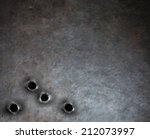 armor metal background with bullet holes