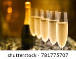 Many glasses of champagne in a line. Selective focus. Vintage tone