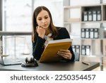 Small photo of Highly skilled female recruiter consulting online on laptop in office meeting white lawyer or financial advisor convene law in video conferencing and audio calls on social media applications.