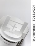 Small photo of Abstract architectural white background with space for text. Model of nonexistent contemporary round church close up, selective focus.