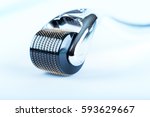 derma roller on white ... | Shutterstock . vector #593629667